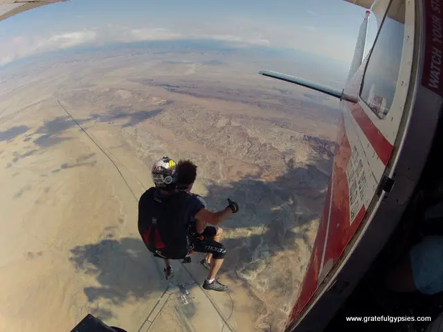 Jumping out of a plane above Moab.